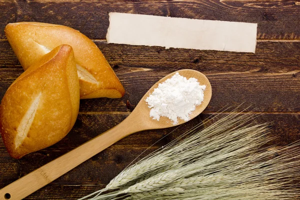 Buns with flour and ears — Stock Photo, Image