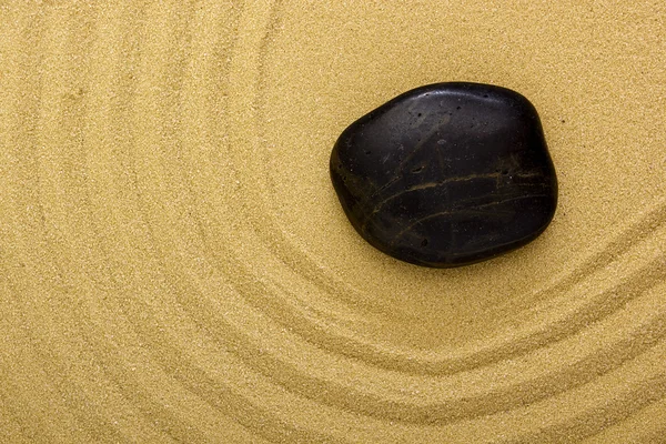 Zen stone in the sand — Stock Photo, Image