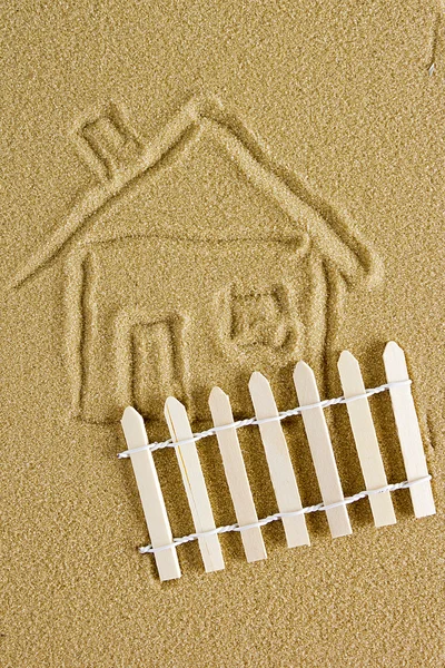 Drawing of a house on the sand — Stock Photo, Image