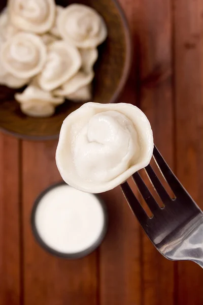 Dumplings on a fork — Stock Photo, Image