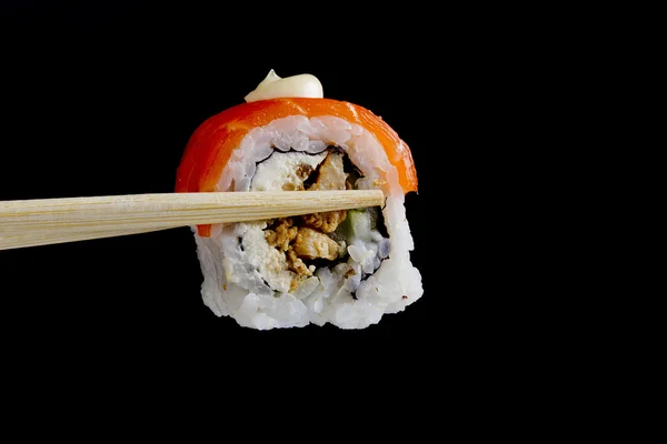 Sushi v dřevěné hůlky — Stock fotografie