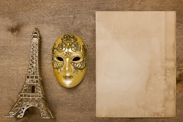 Gold theatrical mask and the Eiffel Tower — Stock Photo, Image