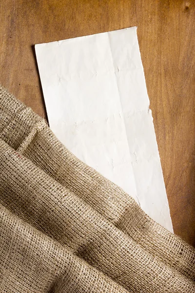 Sackcloth and cardboard tag — Stock Photo, Image