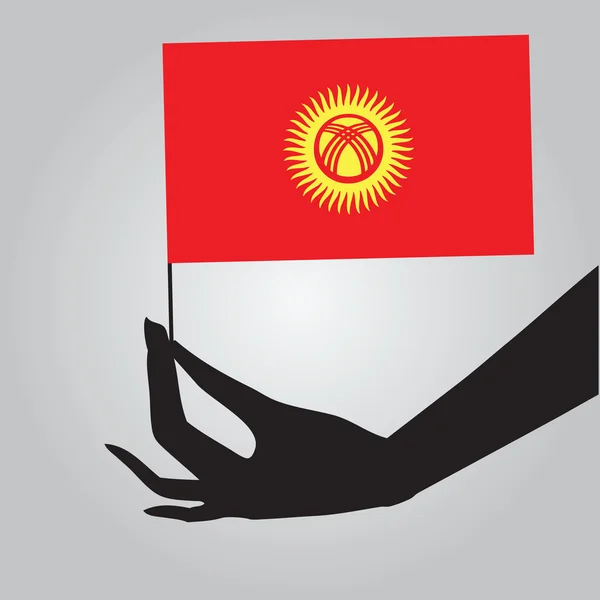 Mano con bandiera Kirghizistan — Vettoriale Stock