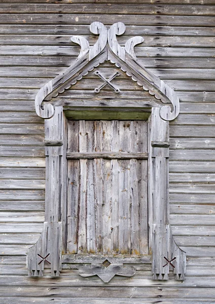 Boarded window of ancient wooden church — Stock Photo, Image