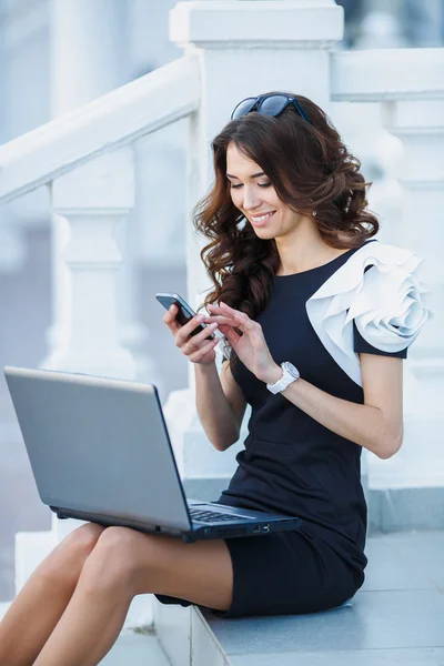 The woman, a successful businessman working on laptop. — Stock Photo, Image