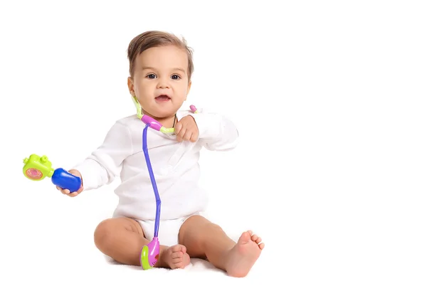 Ritratto di bambino con stetoscopio su sfondo bianco — Foto Stock