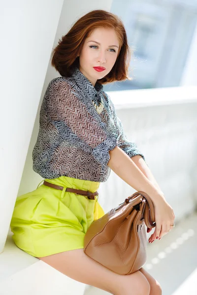 A girl walking down the street with a happy smile — Stock Photo, Image