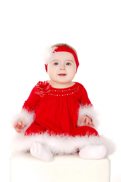 Little girl in Santa costume. — Stock Photo, Image