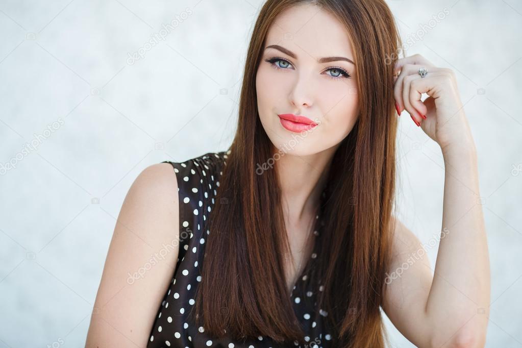 Beautiful woman with long brown hair.