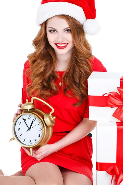 Mooie meisje met een gift op een witte achtergrond. — Stockfoto