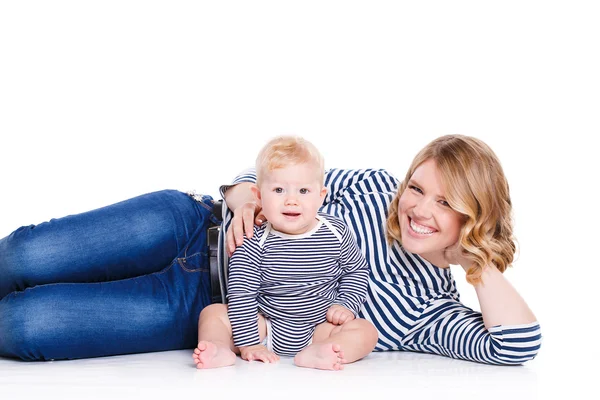 Young mother playing with her little son. — Stock Photo, Image