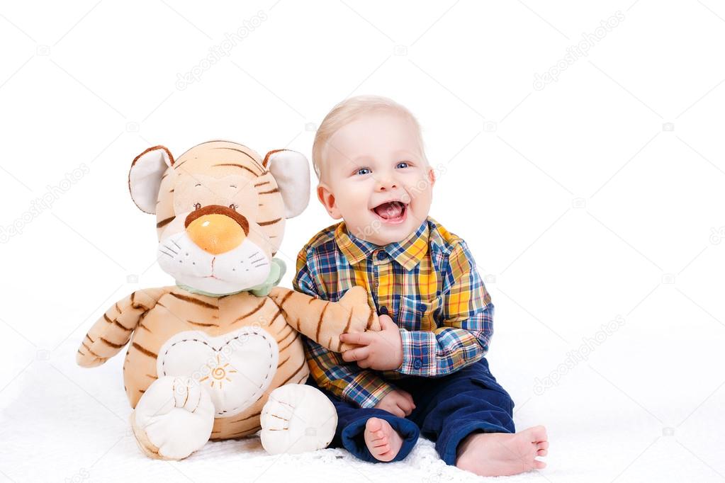 Portrait of a little boy on white background.