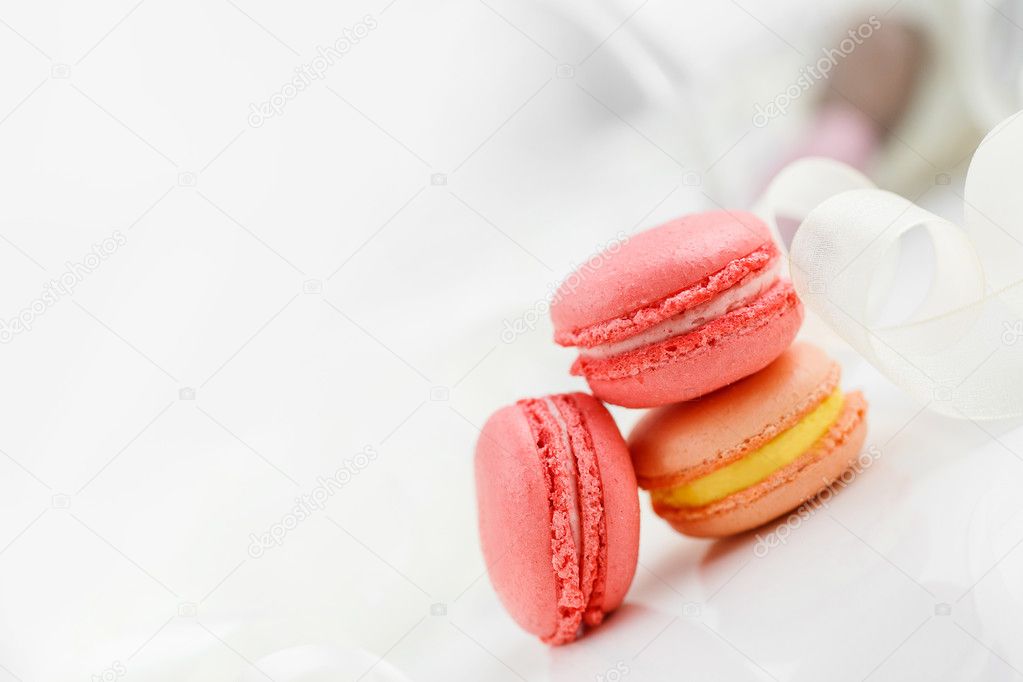 Colorful French pastry on a white background.