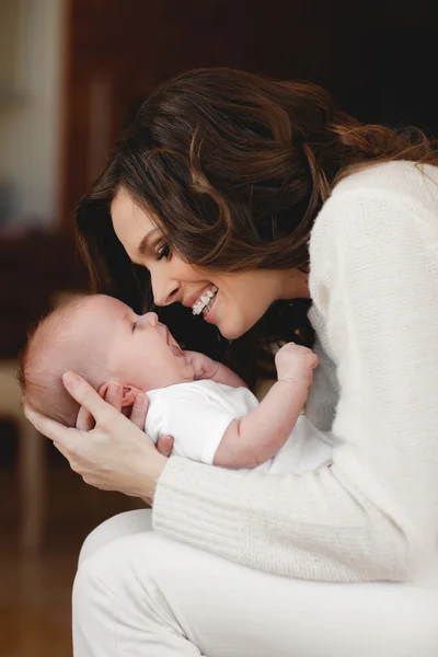 Happy mother with newborn baby — Stock Photo, Image