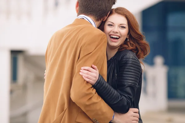 Couple in love on the background of the spring city. — Stock Photo, Image