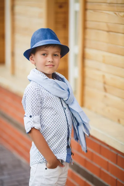 Portrait of a stylish boy on the street near the house — Stock Photo, Image