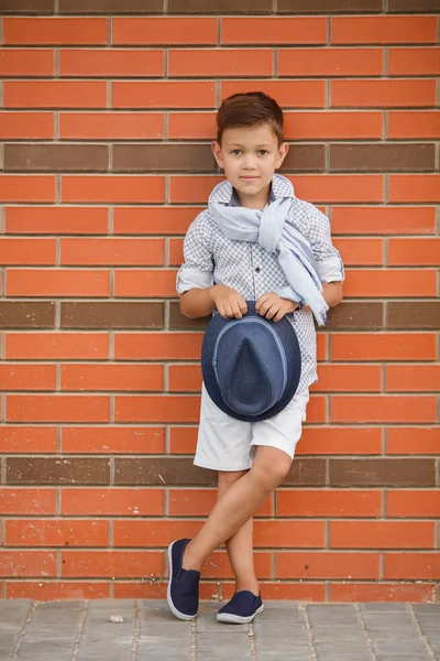 Portrait of a stylish boy on the street near the house — Stock Photo, Image