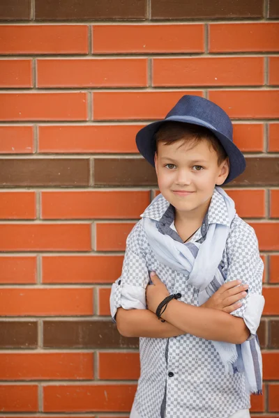 Portrait of a stylish boy on the street near the house — Stock Photo, Image