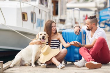 Couple in love at the pier before sailing to travel
