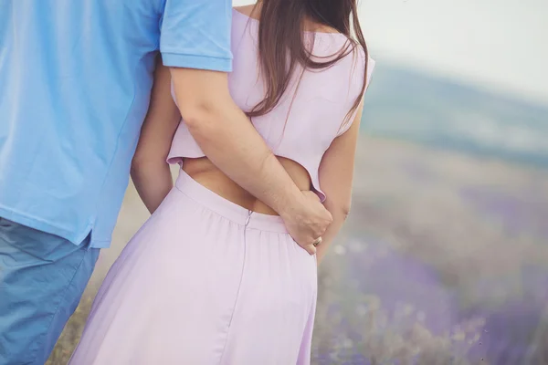 Young couple in the lavender fields — Stock Photo, Image