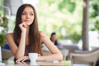 Morning coffee in a cafe for a beautiful woman