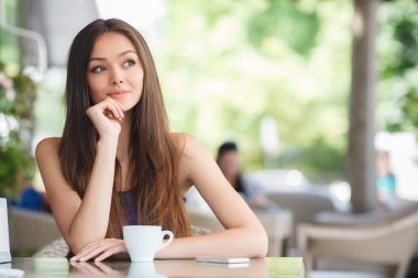 Morning coffee in a cafe for a beautiful woman