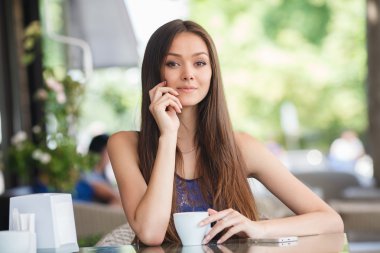 Morning coffee in a cafe for a beautiful woman
