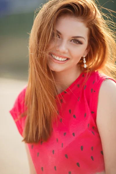 Portrait of beautiful woman with red hair — Stock Photo, Image