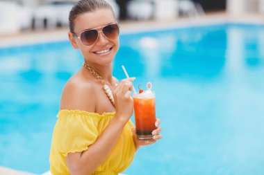 Beautiful woman on a tropical resort.