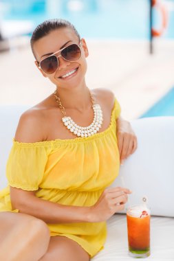 Beautiful woman on a tropical resort.