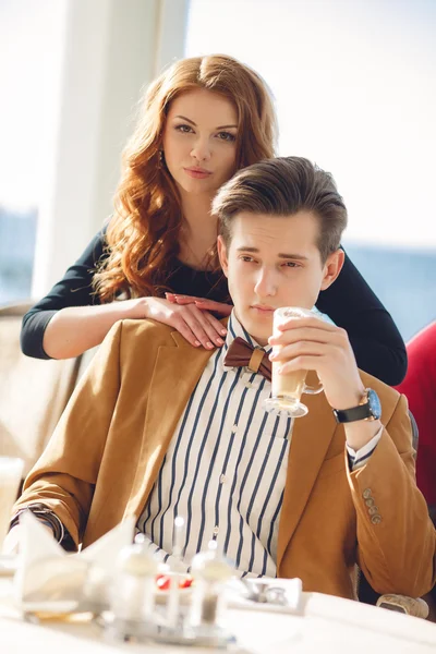 A couple in love in a summer cafe — Stockfoto