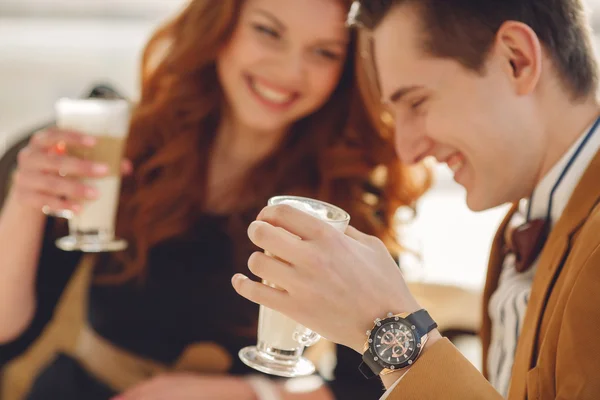 A loving couple enjoying an aromatic coffee in the cafe — Stock Photo, Image