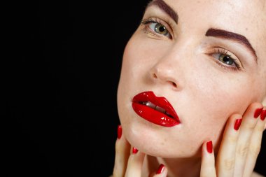 Studio portrait of a redhead female model.