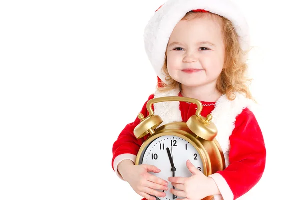 Girl dressed as Santa with a big clock — Stockfoto
