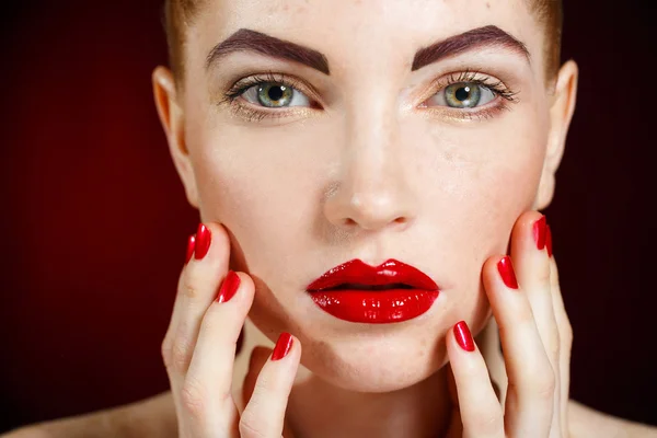 Studio portrait of a redhead female model. — ストック写真