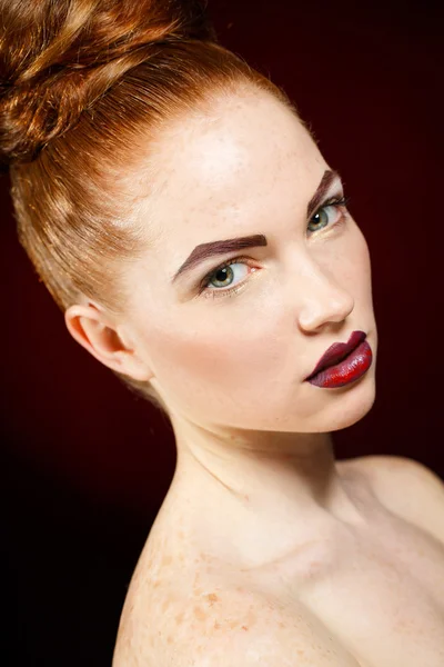 Studio portrait of a redhead female model. — Stock Fotó