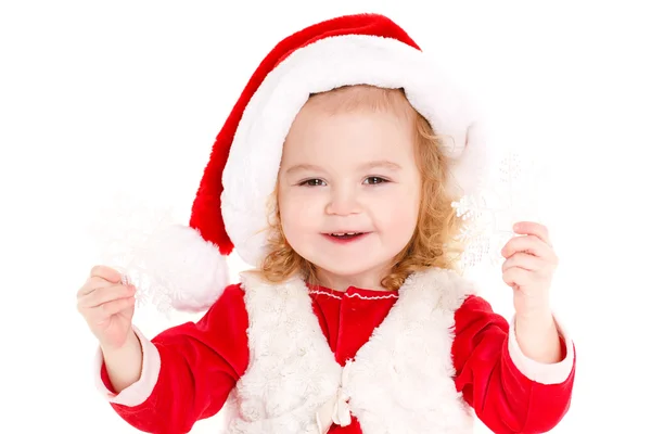 Little girl dressed as Santa Claus. Stock Picture
