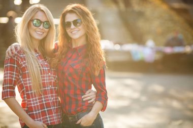 Beautiful young women on walk in park