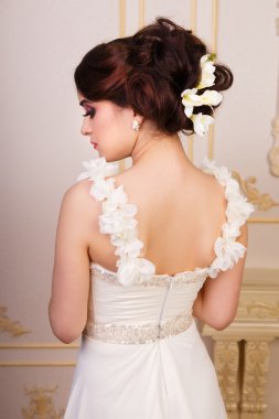 Bridal hairstyle with accessories from the back