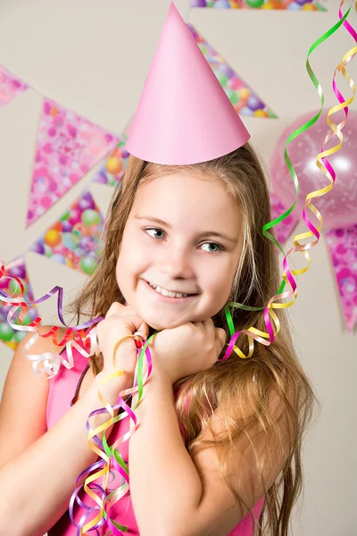 Funny girl in birthday cap — Stock Photo, Image