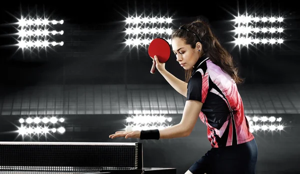 Young pretty sporty girl playing table tennis — Stock Photo, Image