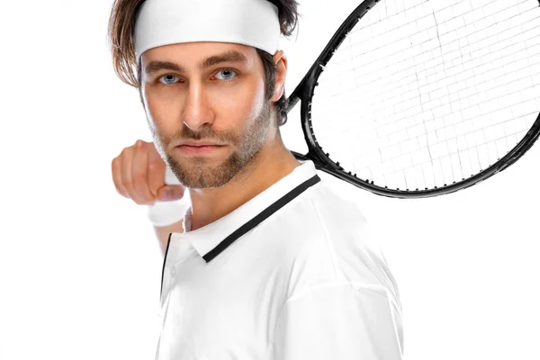 Tennis player with racket in white costume. Man athlete playing isolated on light background. — Stock Photo, Image