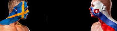 21 İsveç, Slovakya 'ya karşı. Yüzünde bayrak olan futbol ya da futbol atleti. Kopyalama alanı ile spor kavramı.