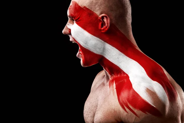 Österrike fan. Fotboll eller fotbollsspelare med flagga bodyart i ansiktet. Sport koncept med copyspace. — Stockfoto