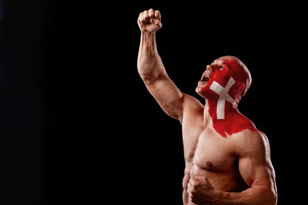 Ventilador Suiza. Atleta de fútbol o fútbol con bodyart bandera en la cara. Concepto deportivo con copyspace. — Foto de Stock