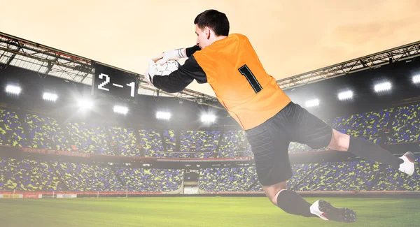 Goalkeeper is catching ball — Stock Photo, Image