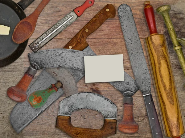 Vintage bakery shop utensils over wooden table — Stock Photo, Image