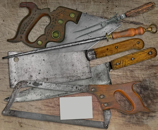 Vintage butcher shop set over wooden table — Stock Photo, Image