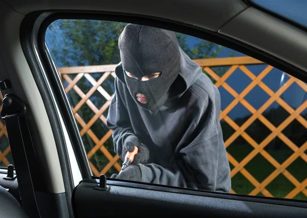 Man stealing car Stock Image